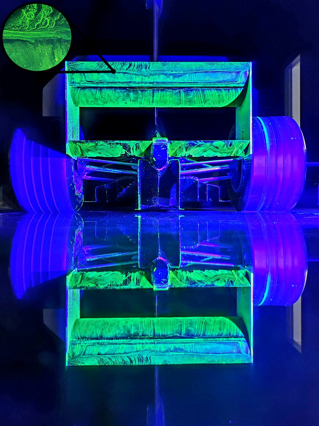 The photo depicts turbulent boundary layers and flow separation over the rear wing of a model open-wheel race car in the RJ Mitchell wind tunnel at the University of Southampton. The freestream velocity is 20m/s and flow-vis oil was used to visualise the flow structures.
